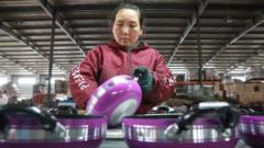 Shares slide in Asia as new Trump tariffs loom