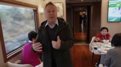 Watch: BBC joins retirees aboard China’s ‘silver trains’ that aim to boost economy