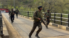 More than 20 killed after gunmen open fire on tourists in Indian-administered Kashmir