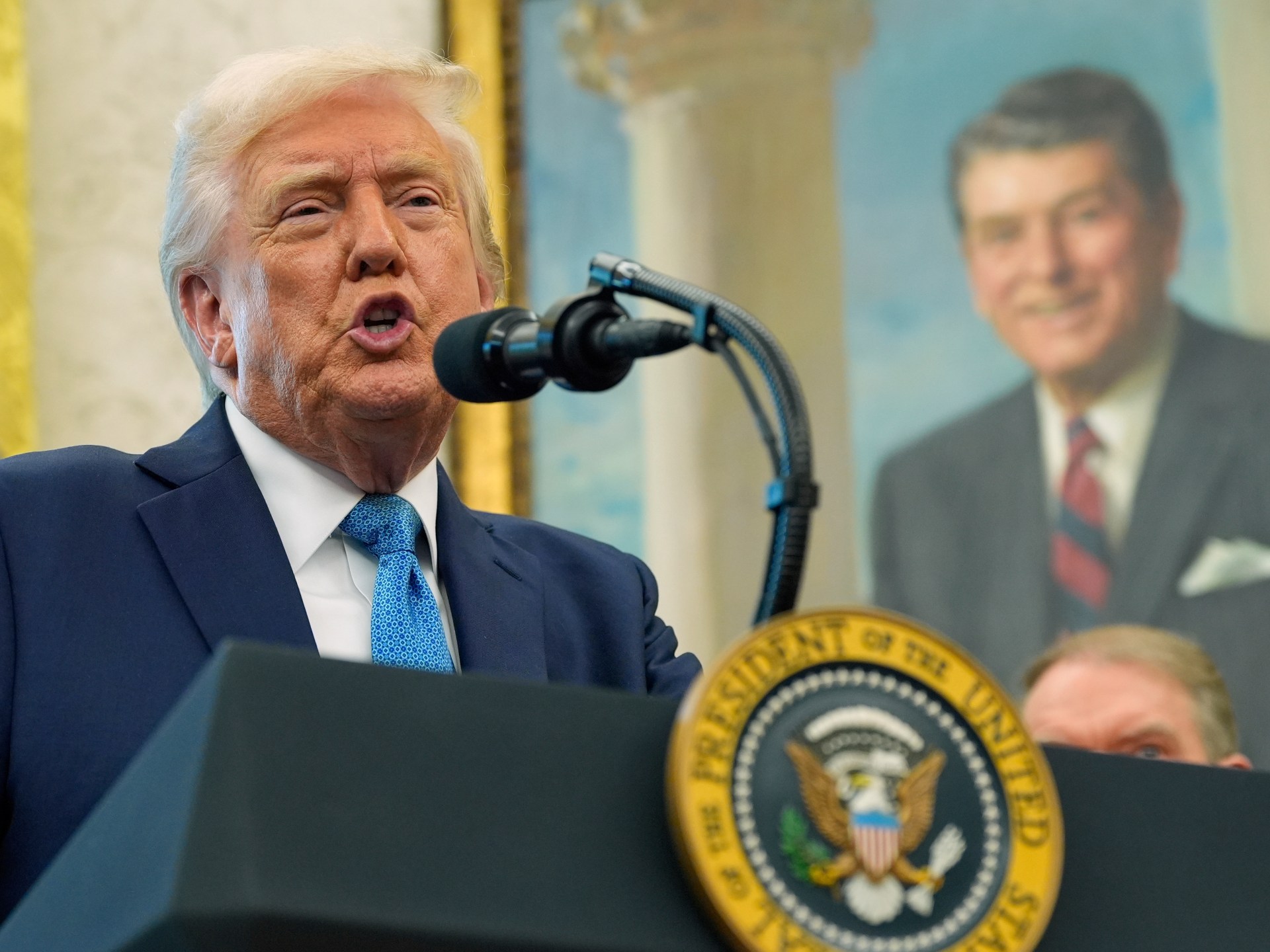 Trump backs off threat to fire Fed Chair Powell, as stock market surges