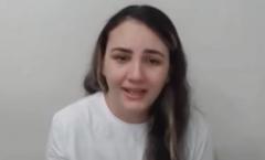 Woman who used lipstick to write on statue during Brazil unrest jailed for 14 years