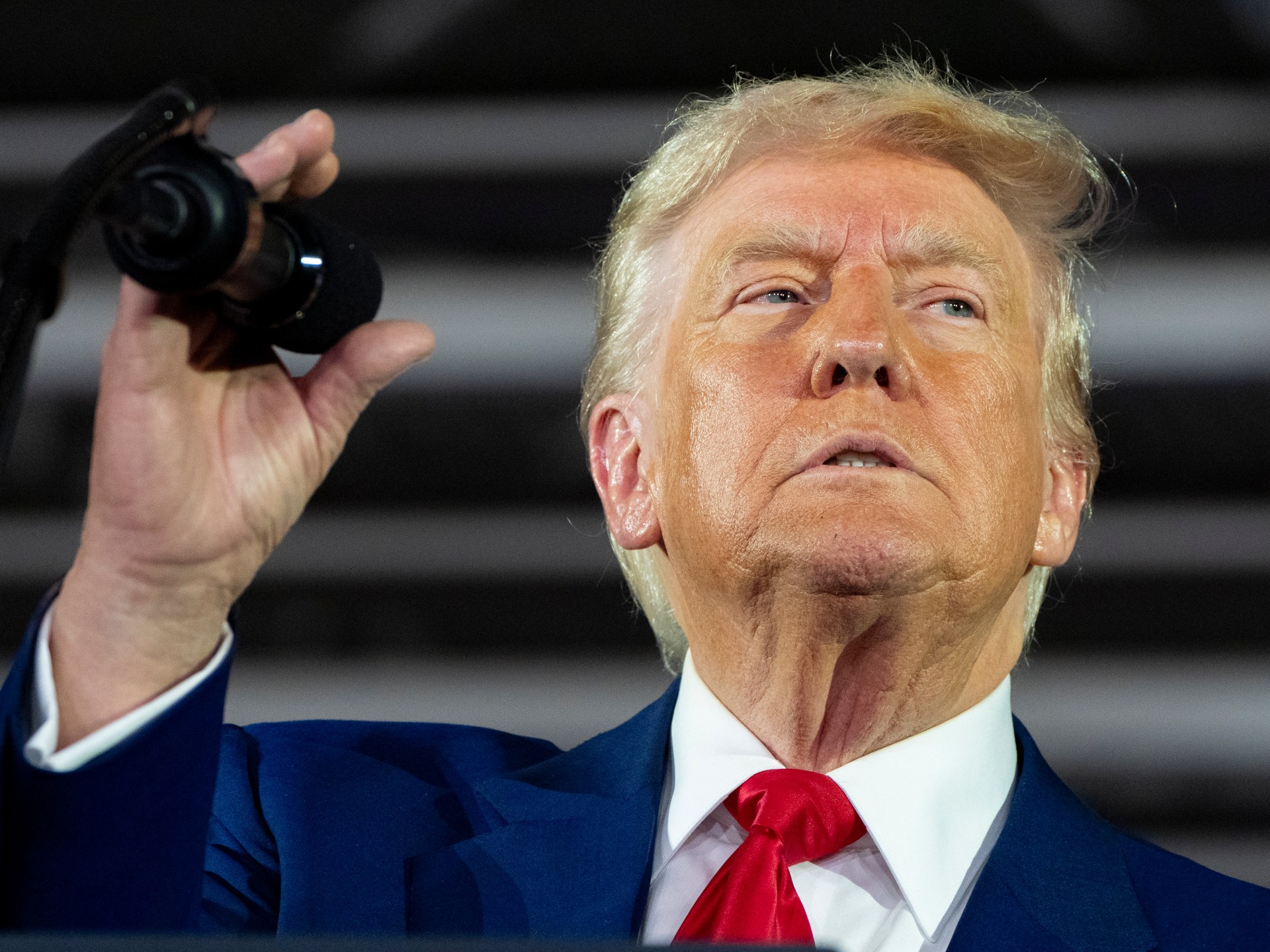 Fact-checking Trump’s claims at 100-day rally in Michigan