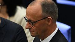 Germany’s Merz wins vote for chancellor after surviving historic defeat