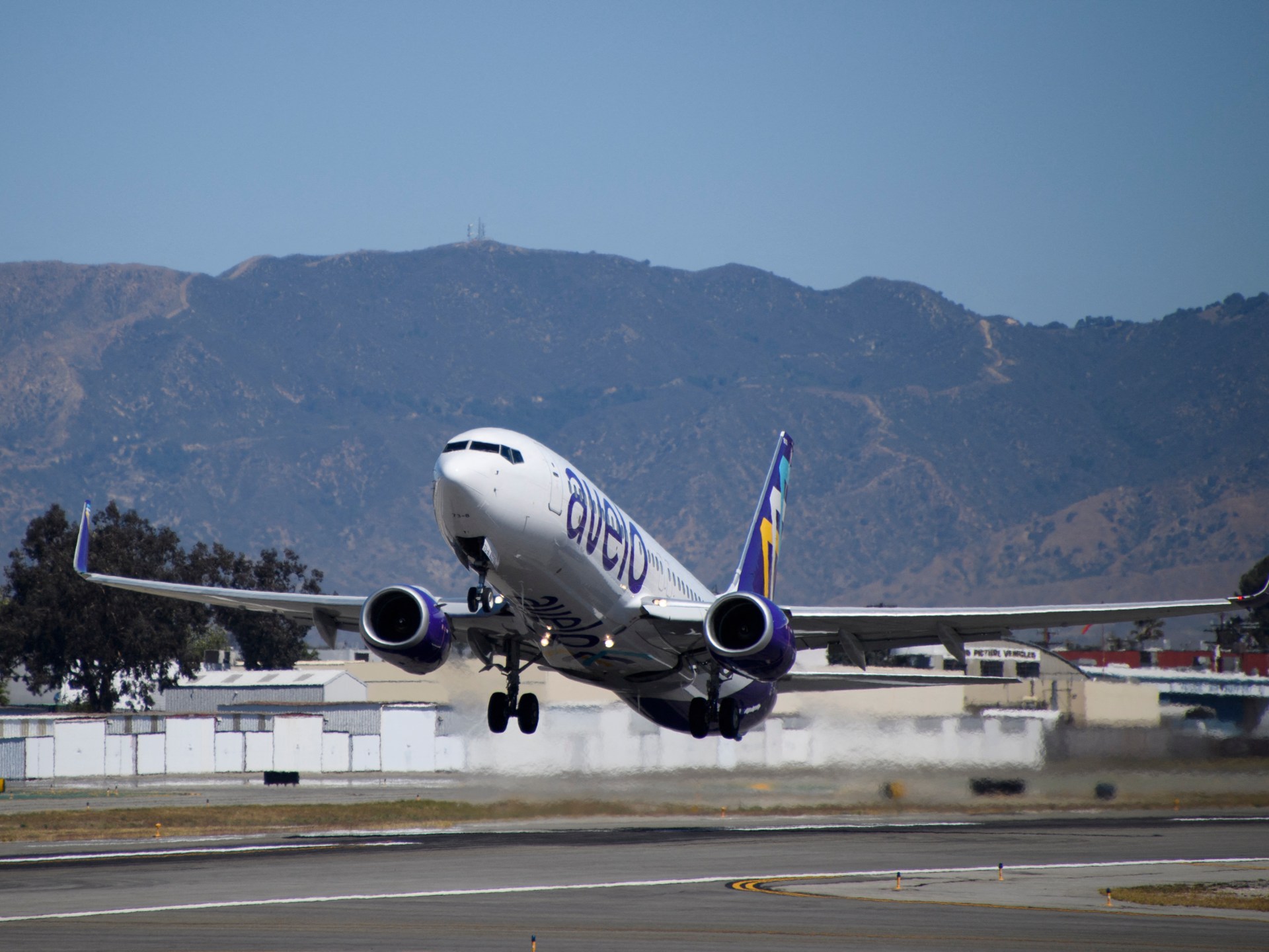 A US airline faces backlash as it begins deportation flights