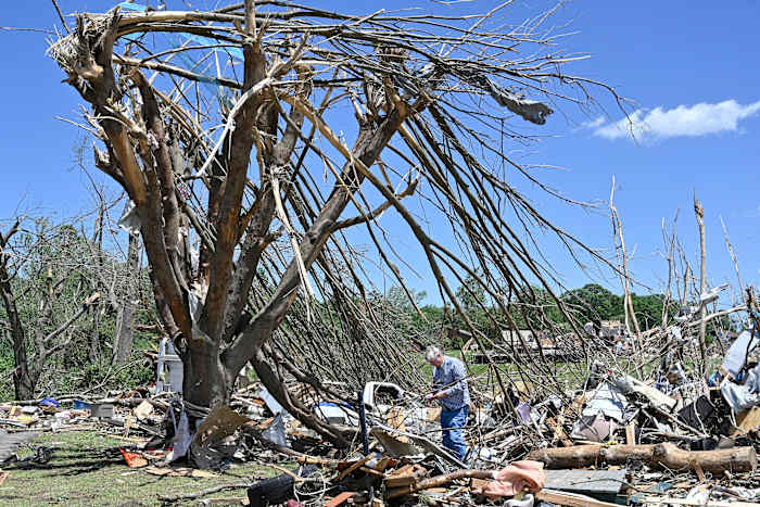 At least 18 killed as severe weather lashes Kentucky, and 9 more die elsewhere