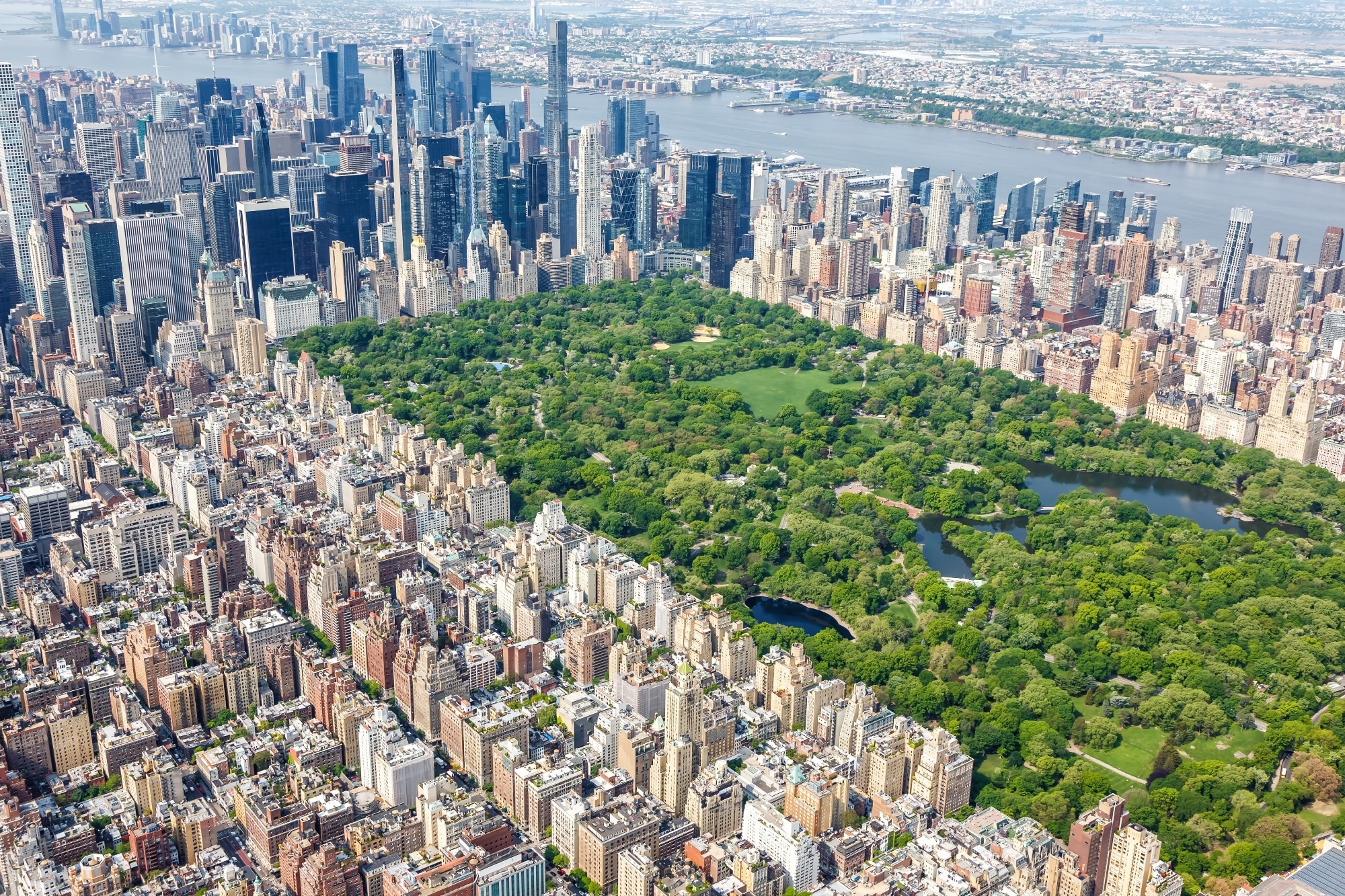 City size reduces obesity and impulsivity through better lifestyle and education