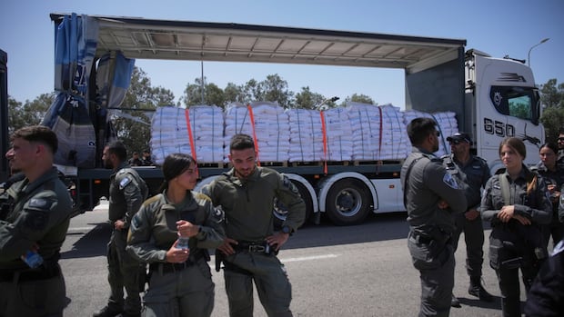 Dozens of trucks of humanitarian aid for Gaza still sitting at border entry