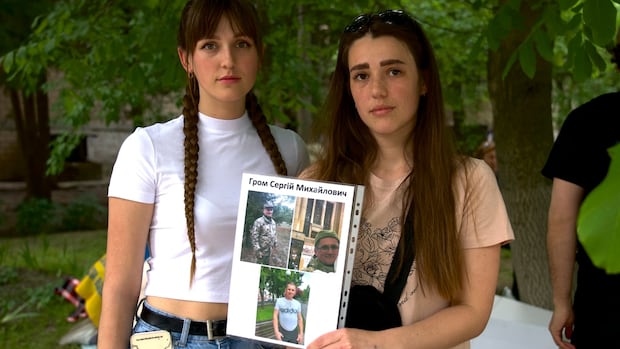 At PoW homecoming, some Ukrainian families reunite as others seek word on loved ones