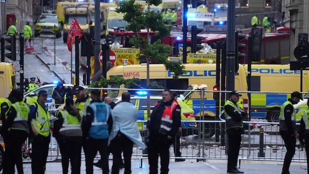 Multiple people hit after minivan plows into crowd of celebrating Liverpool soccer fans