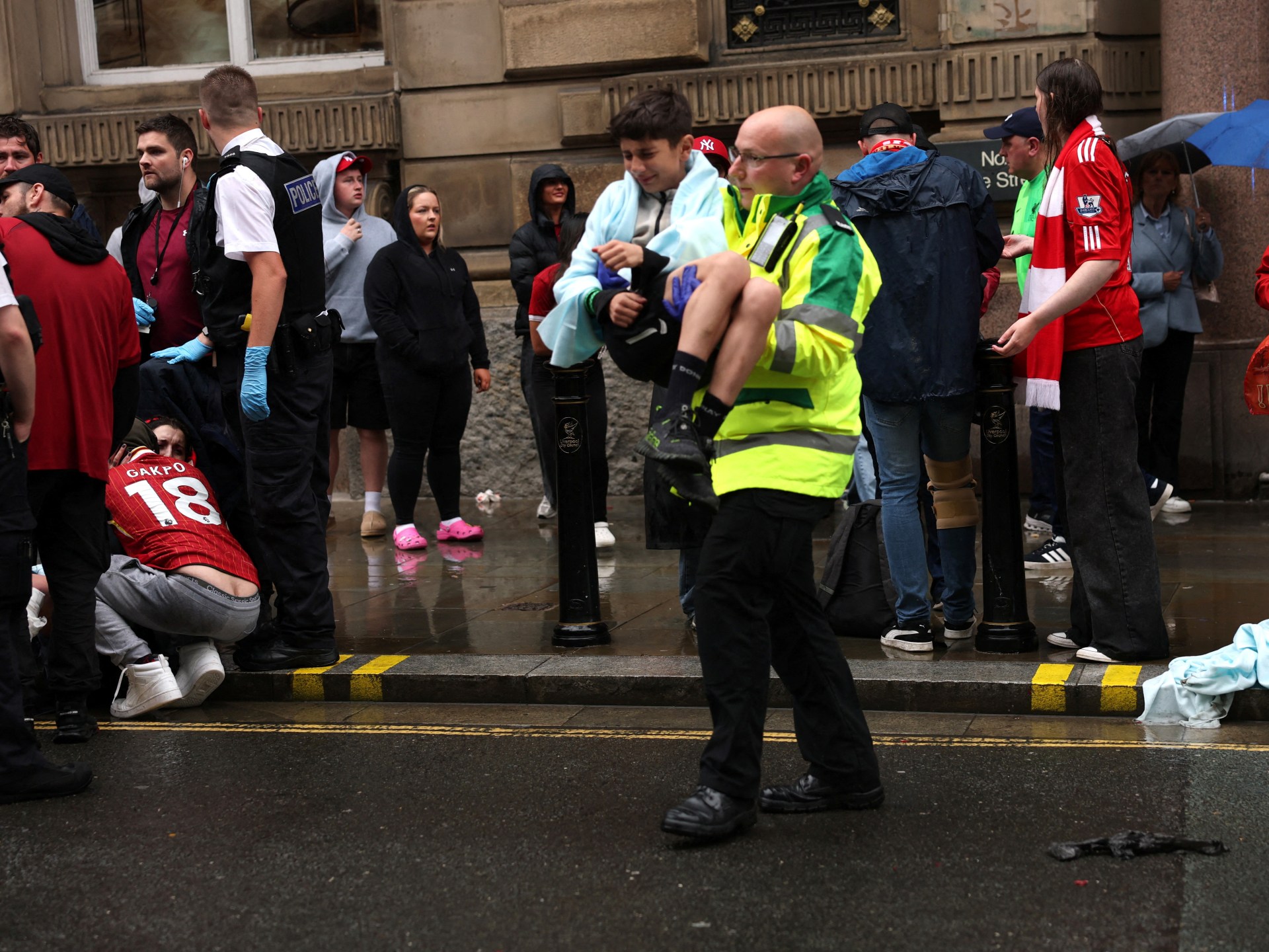 Car ploughs into football fans at Liverpool parade, 27 in hospital