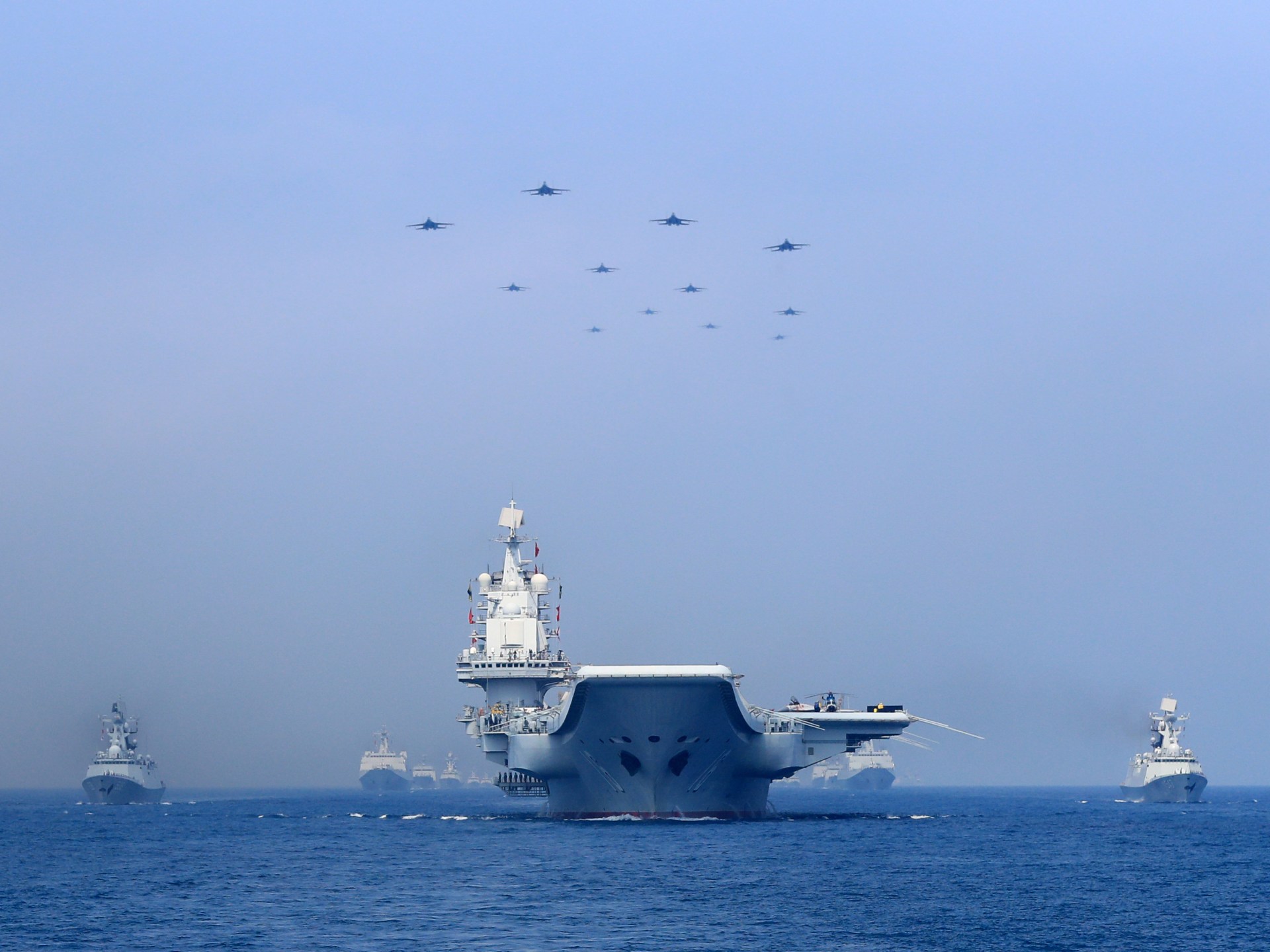China’s navy conducts combat patrols near disputed South China Sea shoal