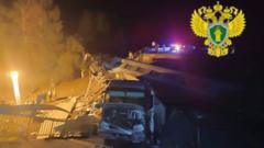 At least three dead after Russian bridge collapses onto train