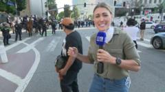 Australian journalist hit by ‘rubber bullet’ while reporting from LA