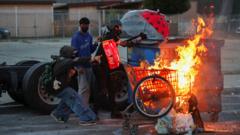 Watch: Police use tear gas, flash grenades to disperse LA protesters