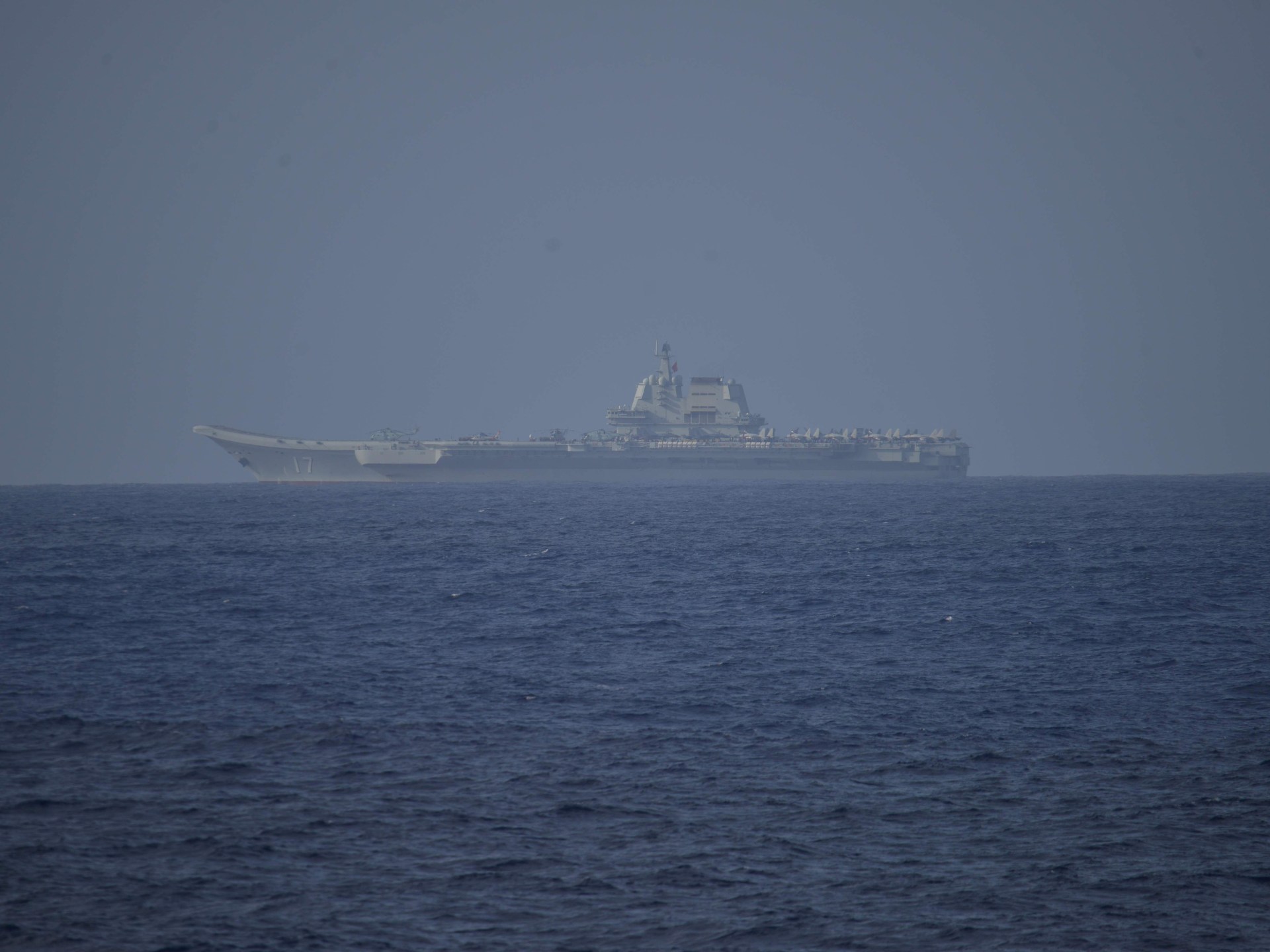 Two Chinese aircraft carriers seen in Pacific for first time, Japan says