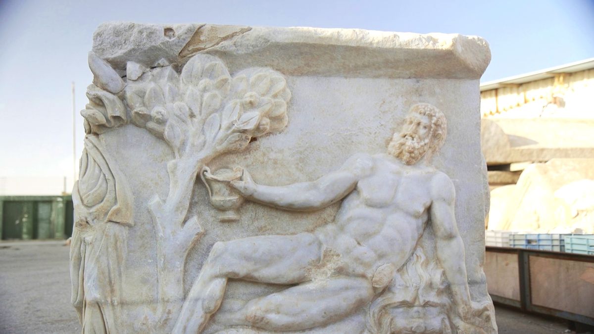 ‘Extraordinary’ sarcophagus discovered in Israel shows carving of Dionysus beating Hercules in a drinking contest