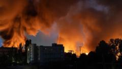 Drones buzz for hours over Kyiv as Russia steps up assault