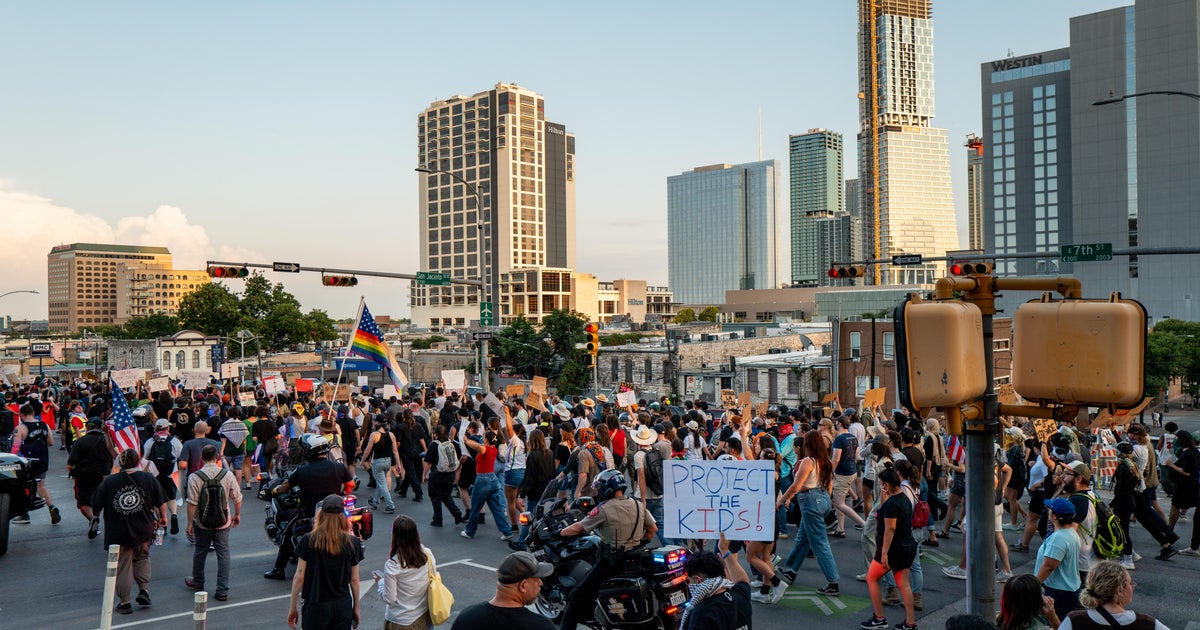 Protests against immigration raids spring up in cities across U.S.