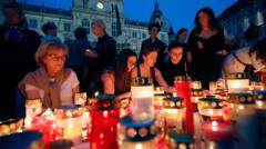 Austrians hold minute of silence and vigil for 10 victims of school shooting