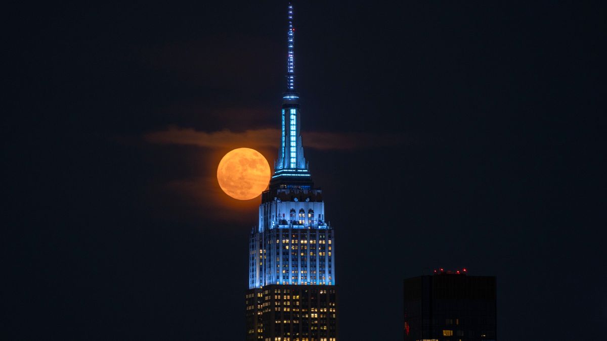‘Strawberry Moon’ in pictures: Major lunar standstill sees June’s full moon hang low in the sky