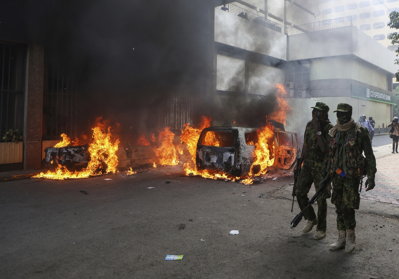 Kenyan police fire tear gas at protest over death of blogger in custody