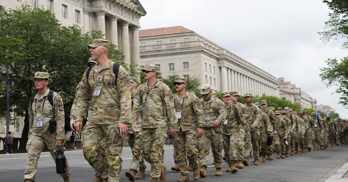 Crowds gather on the National Mall ahead of Trump military parade
