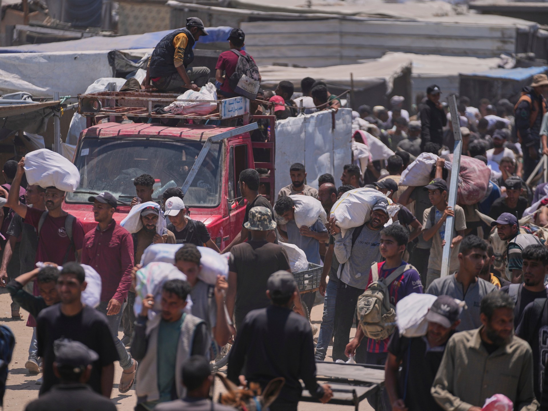 Israel kills at least 79 people in Gaza, many at US-backed aid site: Medics