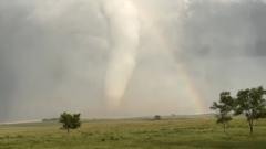 ‘Spectacular’ moment an enormous tornado crosses a rainbow