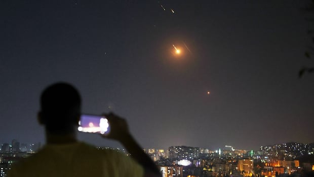 Israeli strikes hit Tehran as Iran’s ayatollah warns U.S. not to join conflict