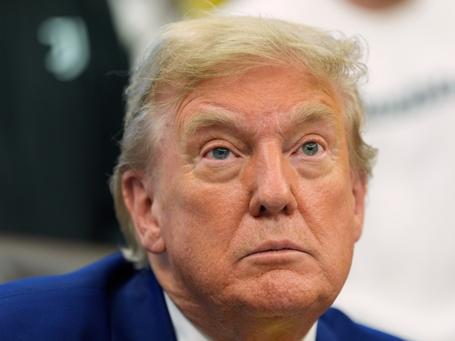 How Trump’s position has changed on Iran, splitting MAGA base