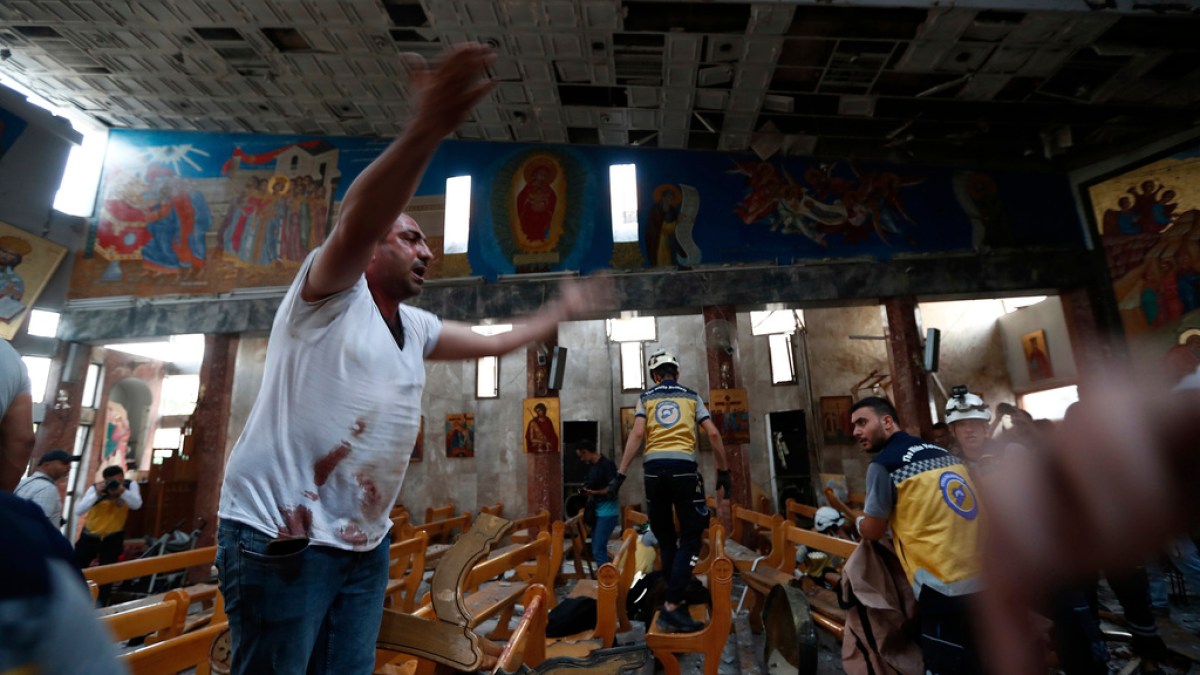 At least 20 killed in Damascus church bombing attack, dozens wounded