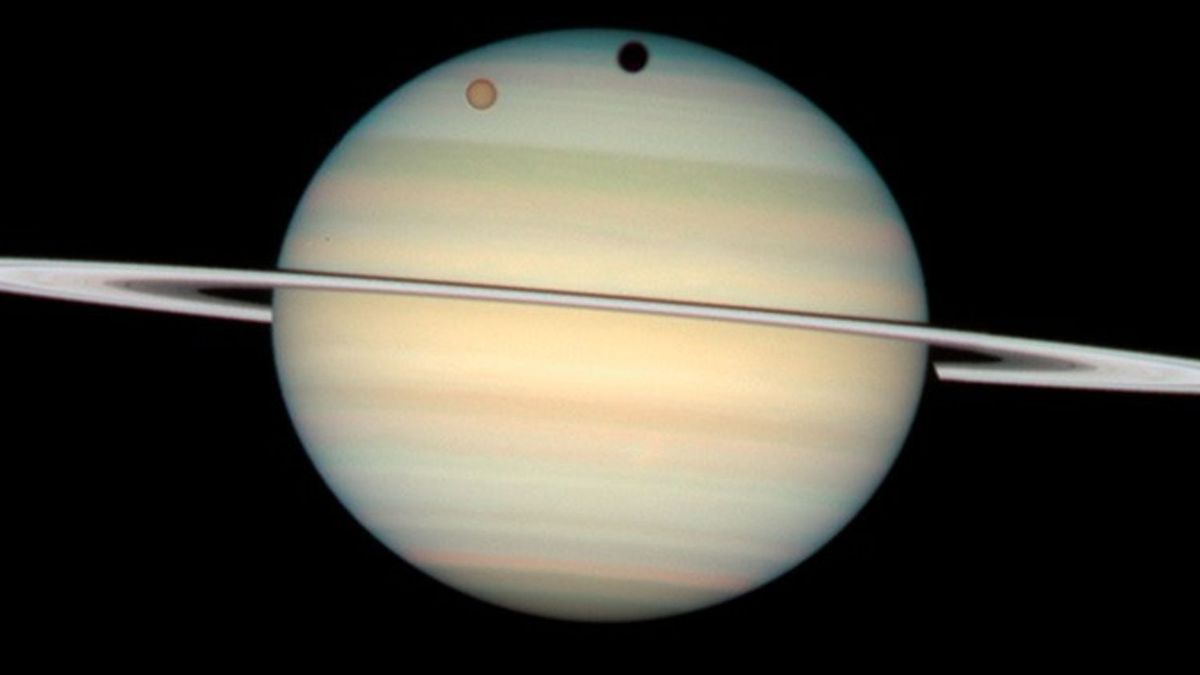 You can see a giant ‘hole’ shoot across Saturn this summer — and it won’t happen again until 2040