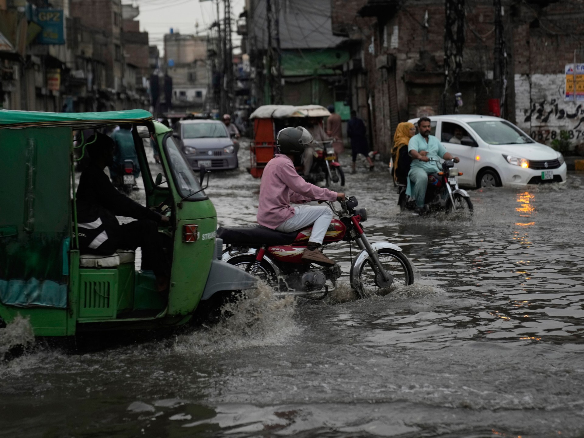 Days of heavy Pakistan rains, floods kill 46, including 13 from one family