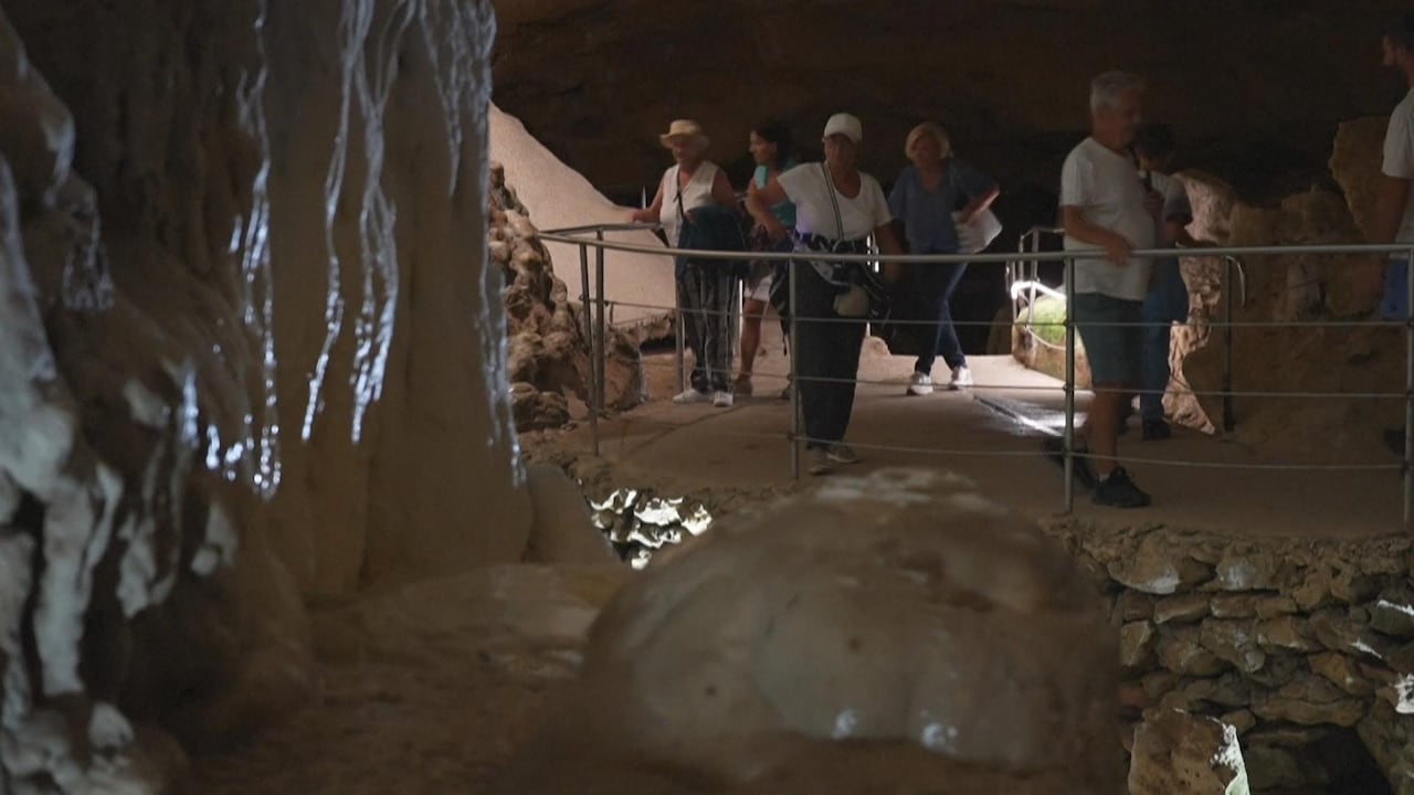 As France swelters, residents and tourists look for relief — including in caves