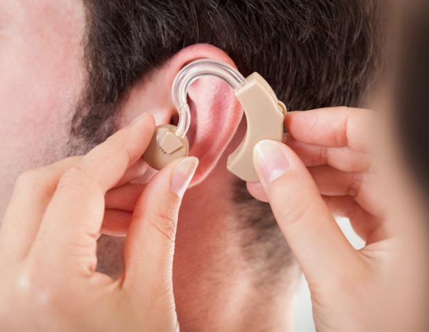 Hearing aids and cochlear implants improve social lives of adults with hearing loss