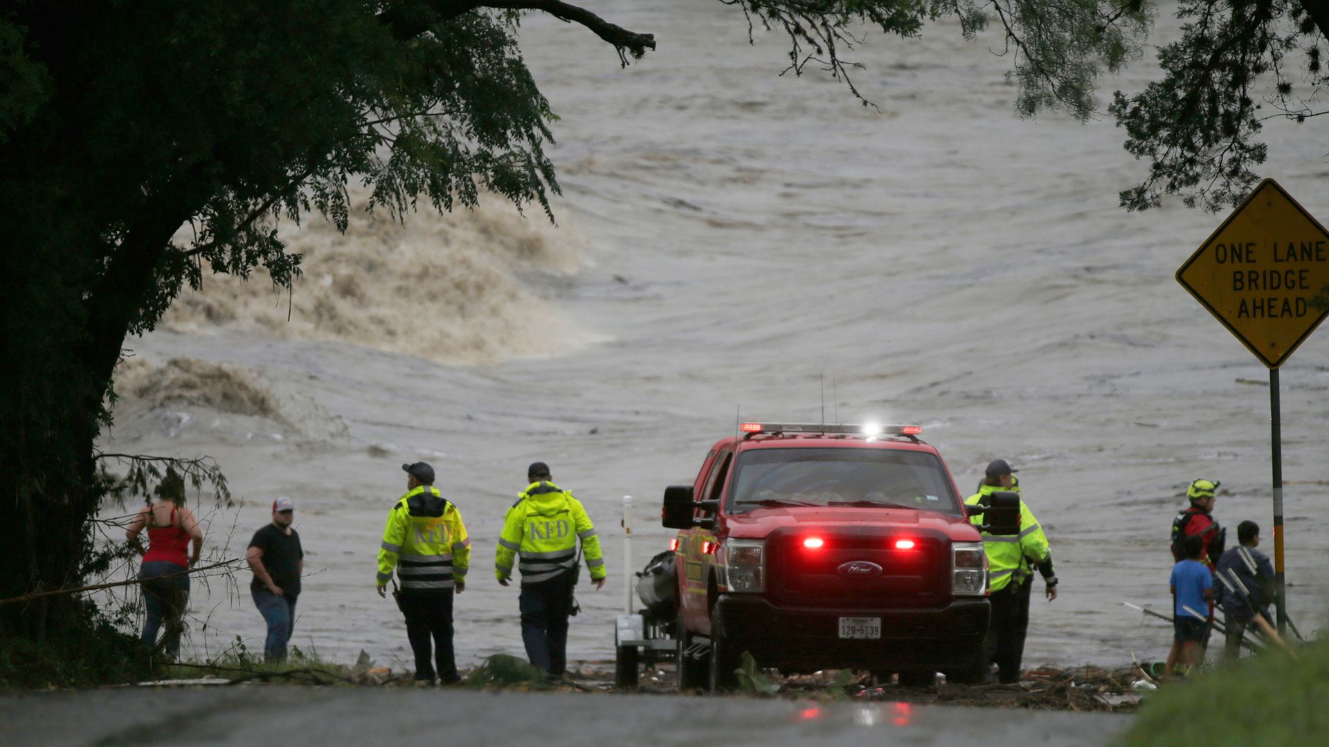 At least 24 dead and more than 20 children missing from camp after flooding