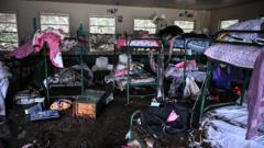 Frantic search for survivors of Texas floods that killed 32, including 14 children