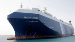 Israel says it struck Houthi-held ports and cargo ship in Yemen