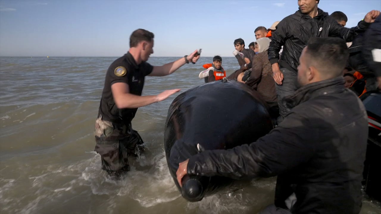 Video shows French police slashing migrant boat in crackdown