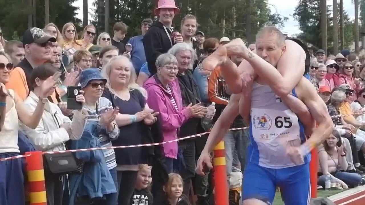 She ain’t heavy, she’s my wife: Wife-carrying contest returns in Finland