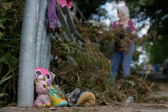 Searchers in helicopters and on horseback scour Texas flood debris for the missing