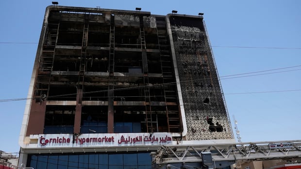 At least 60 people killed after fire breaks out in eastern Iraq shopping mall