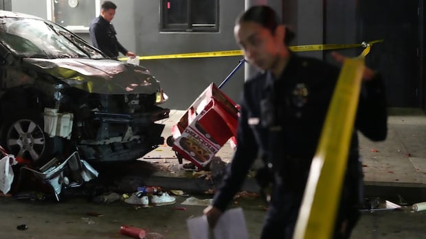 Vehicle strikes people waiting to enter L.A. nightclub, injuring at least 20