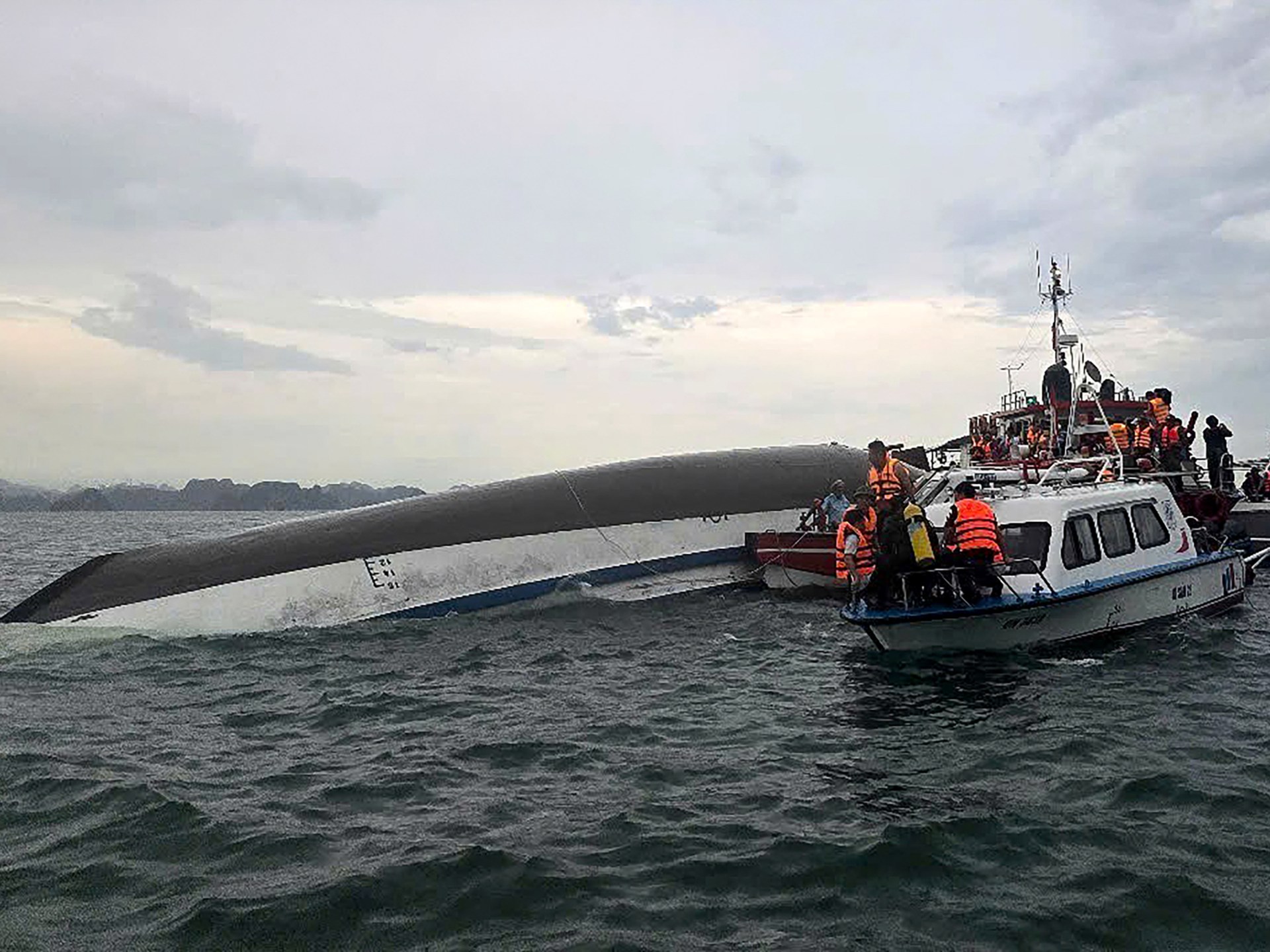 Tourist boat capsizes in Vietnam’s Ha Long Bay, killing 37