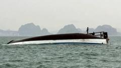 Dozens dead after Ha Long Bay tourist boat capsizes in Vietnam
