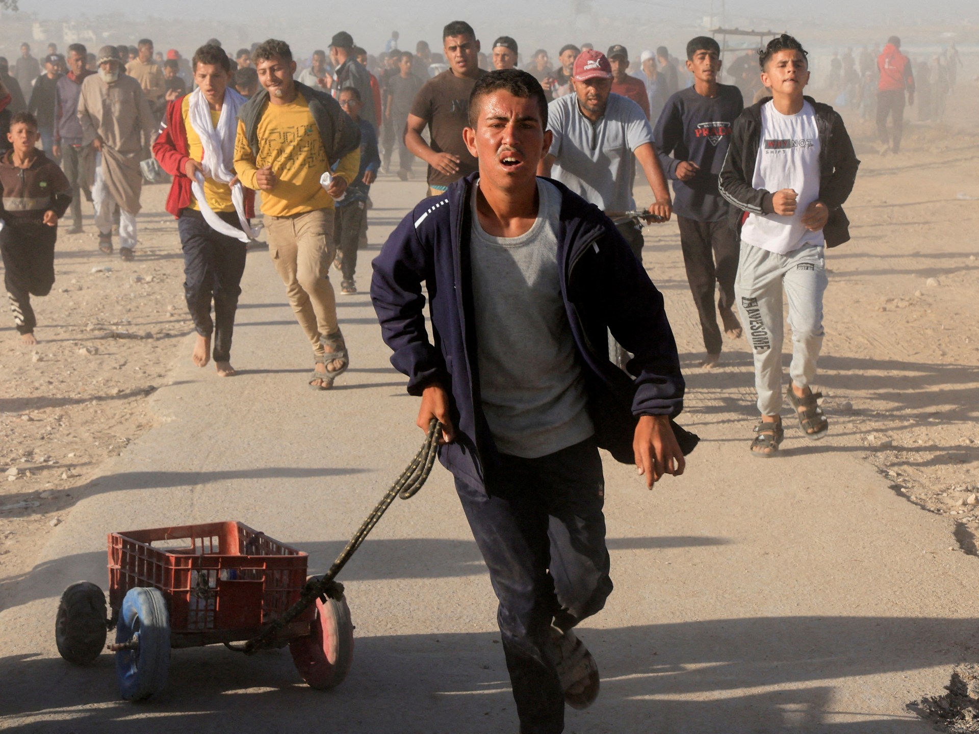 Starving Palestinians pepper-sprayed at GHF aid site in Gaza, video shows