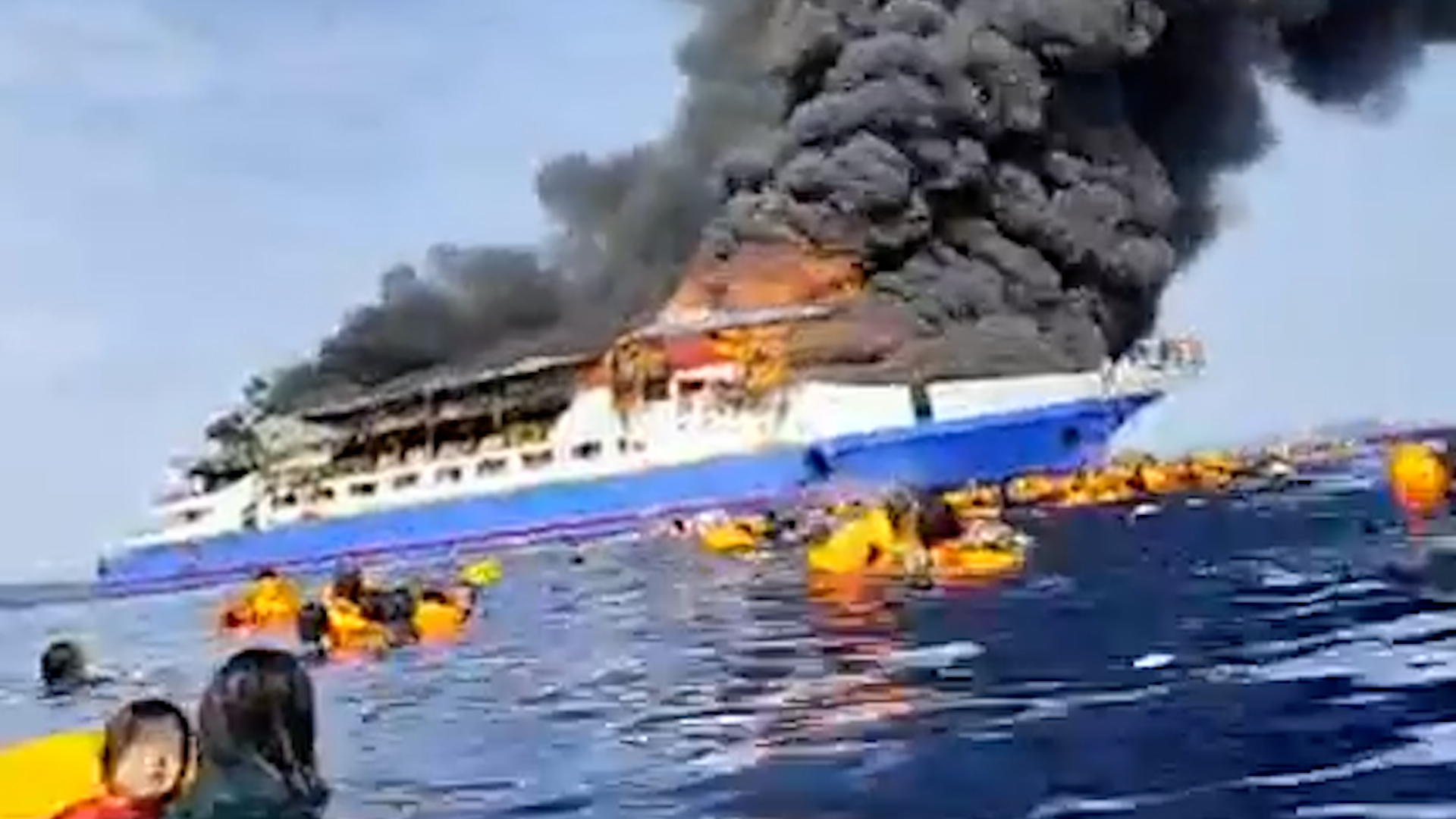 Video: Passengers jump from burning ship into the sea in Indonesia
