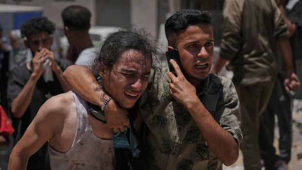Israeli gunfire blamed for 85 fatalities in deadliest day yet for Palestinians seeking aid