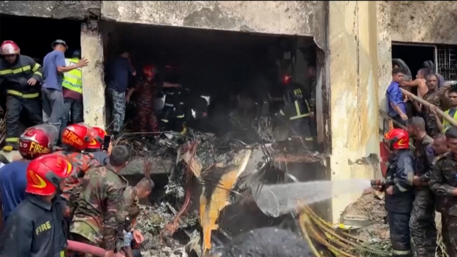 Bangladesh military plane crashes into school building