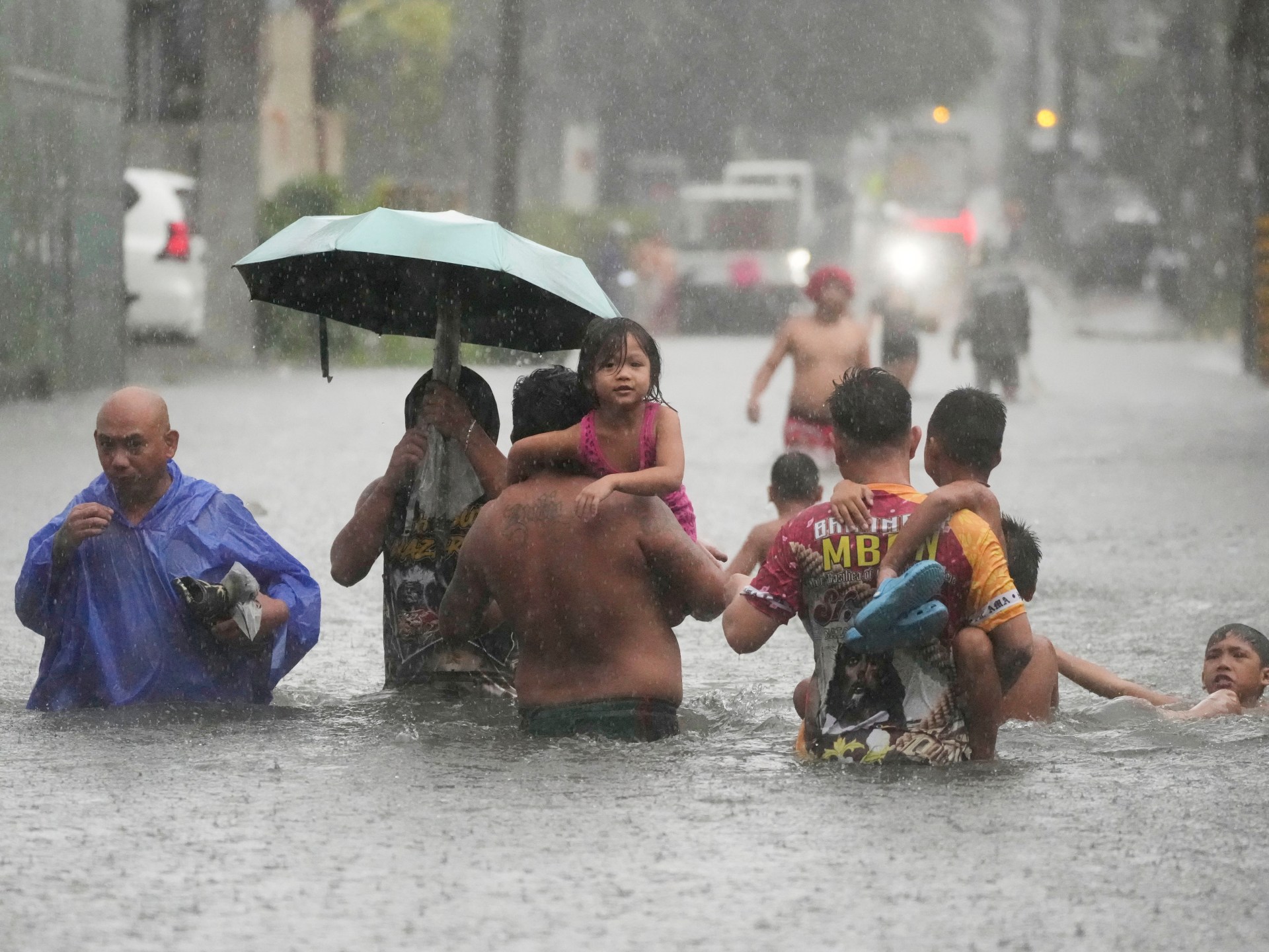 Typhoon Wipha whips Vietnam as Philippines flooding displaces thousands